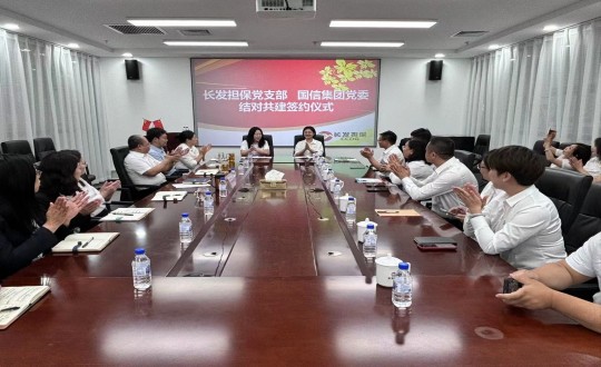 4.永信贵宾会217集团党委与长发担保党支部签署交流共建书_副本.jpg